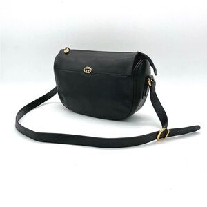 Gucci Black Crossbody Bag with Gold Accents